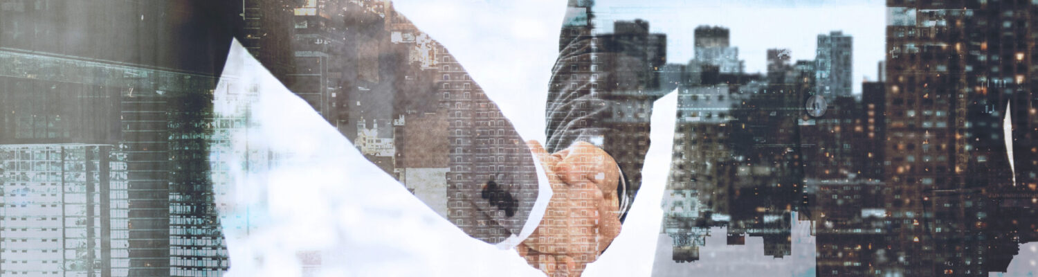 Corporate business handshake between business partners